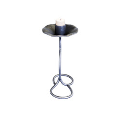 A heart-shaped candle holder on white background.

