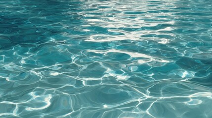 Gentle waves shimmer in vibrant turquoise as sunlight dances across the surface, creating a peaceful atmosphere perfect for relaxation in a tropical paradise.