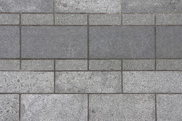 Obraz premium Stone block sidewalk texture background