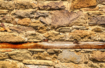 Colorful stone wall background close up view