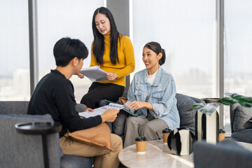 Group of asian business meeting and discussing strategy startup project analysis finance process.Success business people work plan and brainstorm marketing idea in office.Teamwork