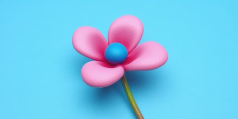 Pink balloon flower on blue background
