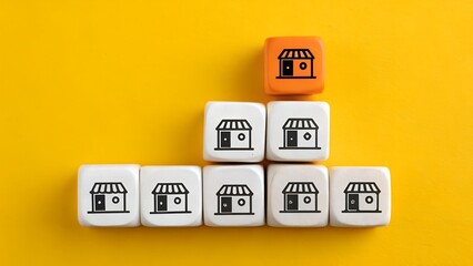 Retail Hierarchy Concept – Pyramid of Cubes with Store Icons, Business Strategy, Leadership, Abstract, Yellow Background
