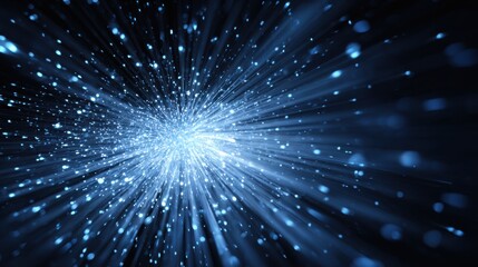Fototapeta premium A vibrant explosion of blue light particles radiates from a central point, creating a stunning visual effect that evokes a sense of cosmic wonder and depth in a dark background.