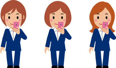 スマホを見る紺色スーツの若い女性