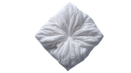 Decoratively folded white terry cloth towel with a textured pattern shaped like a flower.