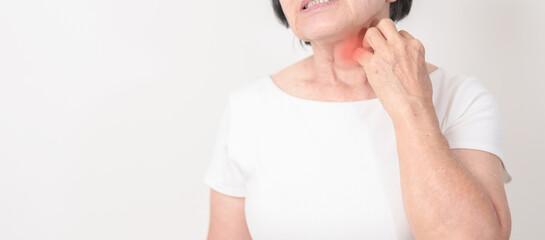 Elderly woman itching Neck and body scratching for Skin Allergy from insect bite and food dermatitis. Dermatology, Leprosy day, Systemic lupus erythematosus, Psoriasis, Urticaria and rash Eczema