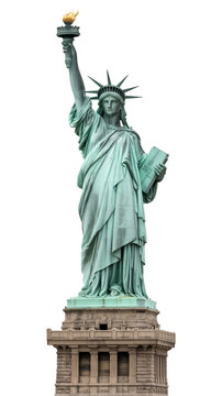 The statue of liberty standing tall against a black background, holding a torch aloft in her right hand