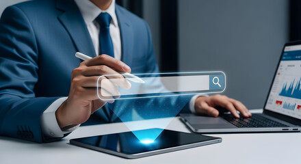 A professional individual in a suit examines data visualizations and digital interface while using various tech devices, focusing on analysis and information.