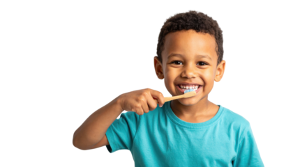 A smiling boy brushing his teeth with a toothbrush, wearing a turquoise shirt.