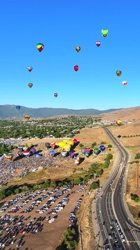 Vertical Clip Hot Air Balloons in Reno Nevada on Blue Sky Day in September 