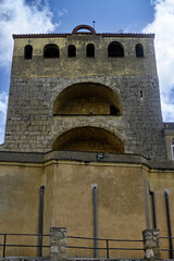 Bell tower of Santa Maria hostel in Astudillo, Palencia, with Romanesque arches