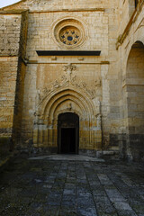 Main tower of San Hipolito el Real church in Tamara de Campos, Palencia, with Gothic entrances