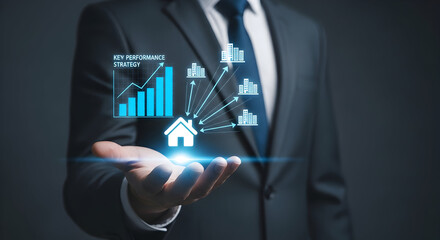 Businessman Holding Holographic Financial Growth and Real Estate Icons