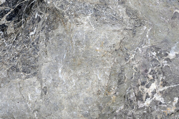 Grey rock surface with natural texture