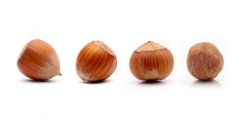 Pile of hazelnuts on a white background