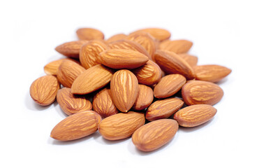 Organic almond nuts on white background.