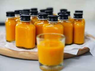 Vibrant and refreshing assortment of detox shots. These small, colorful bottles are filled with a variety of nutrient-rich ingredients that are designed to cleanse and rejuvenate.