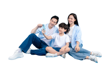 Asian family of three sharing a moment looking at a mobile phone on png background