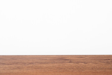Naklejka premium Empty wooden table on white background. Template for product display.