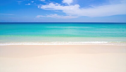 Fototapeta premium Serene tropical beach with turquoise water and white sand under a bright blue sky