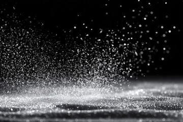 Abstract silver spray on black background