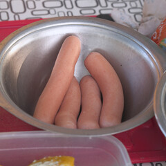 Sausages for cooking in iron plate