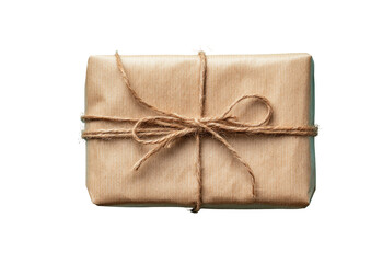Obraz premium A rectangular package wrapped in kraft paper and tied with twine. A simple, rustic gift or parcel