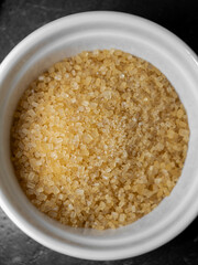 isolated, top view, brown cane sugar crystals