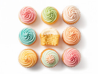 Assorted frosted cupcakes arranged on white background