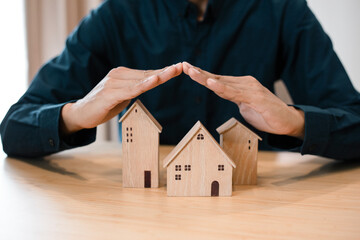 home insurance and real estate protection , Broker agent with model  house rent a house,get insurance or loan real estate or property.