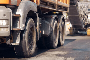 Public city street reconstruction with heavy machines.