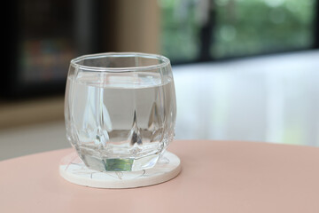 Glass of drinking water on the table. Concept of healthy drink, beverage. with copy space