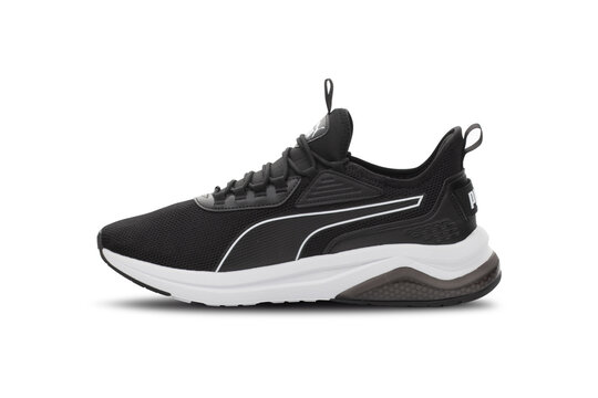 Black Puma running shoes isolated on transparent background