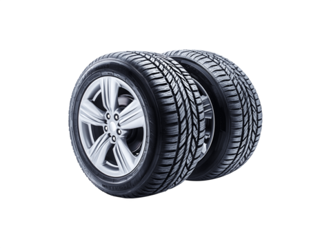 New car tires displayed, highlighting their tread pattern and rubber texture
