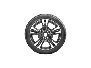 New car tires displayed, highlighting their tread pattern and rubber texture