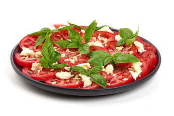 Tomato Caprese Salad with Basil, isolated on white background