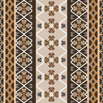 Brown cross-stitch ethnic boho seamless pattern. Tribal pattern. Folk motif. Textile rapport. Pixel pattern for elaborate borders and textiles.