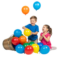 Joyful young boy and girl gleefully playing with colorful balloons spilling from a wooden bucket, capturing pure childhood happiness and festive fun