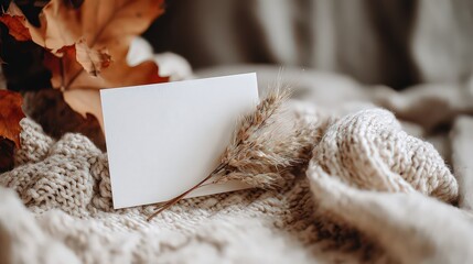 Blank Notecard On Knitted Fabric With Autumn Leaves And Dried Flowers