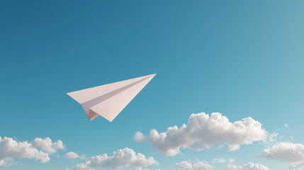 paper airplane flying into the sky