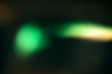 light leak overlay effect with blur bokeh green light leaks,retro noisy film texture light leak flare on black background,abstract colorful background with blur light