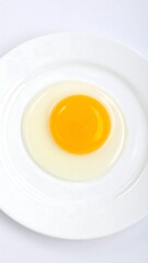Fried egg on a white plate