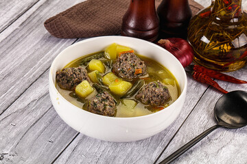 Soup with beef meatballs and vegetables