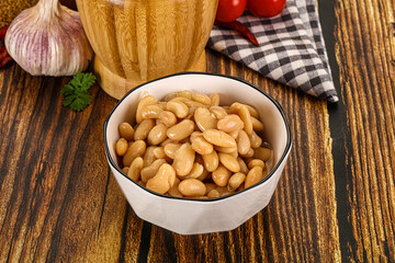 Baked white canned beans in the bowl