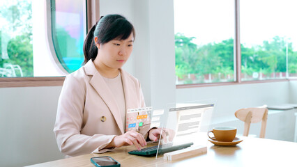 Professional Asian businesswoman managing a project schedule on a futuristic holographic calendar, planning appointments and deadlines with augmented reality technology in a modern office.