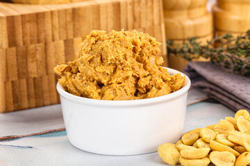 Crunchy peanut butter fat product
