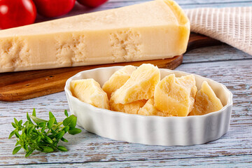 Parmesan cheese pieces in the bowl