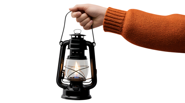 Hand holds classic black lantern with glowing flame inside