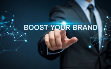 Businessman pointing to boost your brand marketing technology concept.